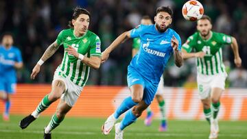 Yuri Alberto of Zenit and Hector Bellerin of Real Betis in action during the UEFA Europa League Knockout Round Play-Offs Leg One match between Real Betis and Zenit de San Petersburgo at Ramon Sanchez-Pizjuan stadium on February 24, 2022, in Sevilla, Spain