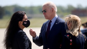 U.S. President Joe Biden is greeted by U.S. Rep. Debbie Dingell (D-MI) and U.S. Rep. Rashida Tlaib at Detroit Metropolitan Wayne County Airport, Detroit, Michigan,U.S., May 18, 2021. REUTERS/Leah Millis TPX IMAGES OF THE DAY