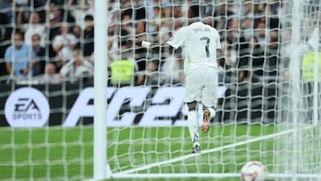 Real Madrid's Brazilian forward #07 Vinicius Junior celebrates scoring his team's third goal during the Spanish league football match between Real Madrid CF and RCD Espanyol at the Santiago Bernabeu stadium in Madrid, on September 21, 2024. (Photo by Thomas COEX / AFP)