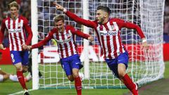 Yannick Ferreira Carrasco celebrates with Antoine Griezmann and Fernando Torres after scoring the first goal for Atletico Madrid
