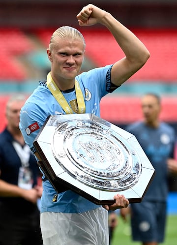 Manchester City's Norwegian striker Erling Haaland celebrates with the English FA Community Shield.