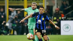 Soccer Football - Champions League - Round of 16 - First Leg - Inter Milan v Atletico Madrid - San Siro, Milan, Italy - February 20, 2024 Atletico Madrid's Angel Correa in action with Inter Milan's Alexis Sanchez REUTERS/Alessandro Garofalo