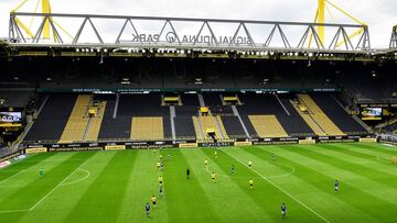 Soccer Football - Bundesliga - Borussia Dortmund v Schalke 04 - Signal Iduna Park, Dortmund, Germany - May 16, 2020 General view of the action and empty stands, as play resumes behind closed doors following the outbreak of the coronavirus disease (COVID-1