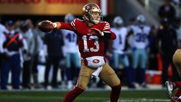 SANTA CLARA, CALIFORNIA - JANUARY 22: Brock Purdy #13 of the San Francisco 49ers throws a pass against the Dallas Cowboys during the first half in the NFC Divisional Playoff game at Levi's Stadium on January 22, 2023 in Santa Clara, California.   Lachlan Cunningham/Getty Images/AFP (Photo by Lachlan Cunningham / GETTY IMAGES NORTH AMERICA / Getty Images via AFP)