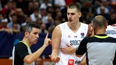 Nikola Jokic of Serbia (R) discusses with referee during the FIBA EuroBasket 2022 group stage match between Serbia and Poland in Prague, Czech Republic, 08 September 2022.