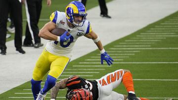 Feb 13, 2022; Inglewood, CA, USA; Los Angeles Rams wide receiver Cooper Kupp (10) gets past Cincinnati Bengals free safety Jessie Bates (30) during the first quarter in Super Bowl LVI at SoFi Stadium. Mandatory Credit: Robert Hanashiro-USA TODAY Sports