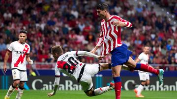 MADRID, SPAIN - OCTOBER 18: Alvaro Morata of Atletico de Madrid battles for the ball with Ivan Balliu of Rayo Vallecano during the LaLiga Santander match between Atletico de Madrid and Rayo Vallecano at Civitas Metropolitano Stadium on October 18, 2022 in Madrid, Spain. (Photo by Diego Souto/Quality Sport Images/Getty Images)