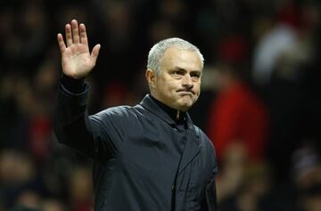 Manchester United manager Jose Mourinho waves to fans after the game.