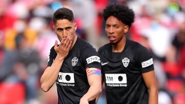 GRANADA, SPAIN - MARCH 12: Fidel celebrates with Johan Mojica of Elche after scoring their team's first goal during the LaLiga Santander match between Granada CF and Elche CF at Nuevo Estadio de Los Carmenes on March 12, 2022 in Granada, Spain. (Phot