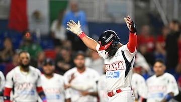 Panama's outfielder #21 Johnny Yussef Santos celebrates after scoring a home run during the Caribbean Series baseball game between Mexico and Panama at LoanDepot Park in Miami, Florida, on February 3, 2024. (Photo by Chandan Khanna / AFP)