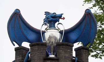 A large blue dragon with a Champions League trophy is seen in Cardiff Castle in Cardiff city centre on May 29, 2017 in Cardiff, Wales.