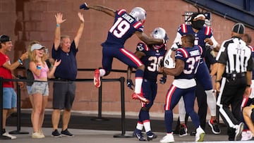 FOXBOROUGH, MA - AUGUST 12: Rhamondre Stevenson #38 celebrates with teammates Cam Newton #1, Damien Harris #37, and Isaiah Zuber #19 of the New England Patriots after scoring a touchdown against the Washington Football Team in the second half at Gillette 