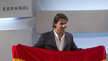 Rafael Nadal with the Spanish national flag ahead of London 2012. 