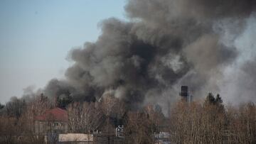 LVIV, UKRAINE - MARCH 18: Smoke is seen above buildings close to the airport on March 18, 2022 in Lviv, Ukraine. Lviv's mayor said on Telegram that the airport was not hit, but an area nearby. While Lviv, and western Ukraine more generally, has been a relative haven since Russia invaded Ukraine last month, there have been missile strikes across the region targeting airports and military sites. (Photo by Getty Images)