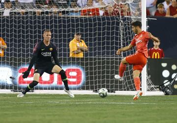 Marco Asensio makes it 1-0 to Real Madrid.