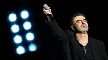 (FILES) This file photo taken on December 01, 2008 shows legendary pop singer George Michael performing in concert at the Zayed Sports City stadium in Abu Dhabi on December 1, 2008. 
 British pop icon George Michael, who was found dead at his home on Christmas Day 2016, died of natural causes, a coroner announced on March 7, 2017. / AFP PHOTO / Karim SAHIB