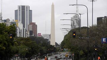 View of 9 de Julio avenue backgrounded by the Obelisk during the lockdown imposed by the government against the spread of the new coronavirus, in Buenos Aires, on May 22, 2020. - Argentina was teetering on the brink of a second default this century on Friday as the deadline for a $500 million bond interest repayment approached. On Thursday, the economy ministry announced that it had postponed talks for a second time with international creditors on the restructuring of $66 billion of debt, this time until June 2. The negotiations were supposed to be completed by May 8 but had already been extended until Friday. (Photo by JUAN MABROMATA / AFP)