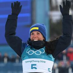 Sweden's Kalla takes Games' first gold, Bjoergen makes history