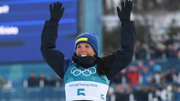 Sweden's Kalla takes Games' first gold, Bjoergen makes history