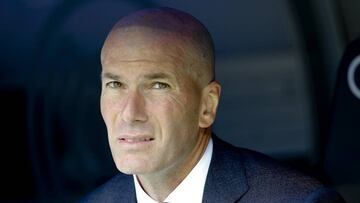 Real Madrid's coach Zinedine Zidane looks on prior to the start of a Spanish La Liga soccer match between Real Madrid and Eibar at the Santiago Bernabeu stadium in Madrid, Spain, Saturday April 6, 2019. (AP Photo/Paul White)