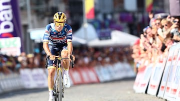 Soudal Quick-Step's Belgian rider Remco Evenepoel crosses the finish line in second position at the end of the Men's Elite road race of the Belgian Cycling Championships, 230km from and to the Grand Place square in Binche, on June 29, 2025. (Photo by DAVID PINTENS / Belga / AFP) / Belgium OUT