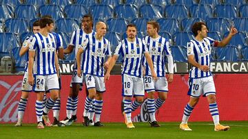 Swedish forward Alexander Isak (5R) celebrates his goal with teammates during the Spanish league football match between Real Sociedad and Real Betis at the Anoeta stadium in San Sebastian on January 23, 2021. (Photo by ANDER GILLENEA / AFP)
