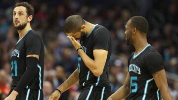 CHARLOTTE, NC - FEBRUARY 11: Teammates Marco Belinelli #21, Nicolas Batum #5 and Kemba Walker #15 of the Charlotte Hornets react after a play by Batum late in their game against the Los Angeles Clippers at Spectrum Center on February 11, 2017 in Charlotte, North Carolina. NOTE TO USER: User expressly acknowledges and agrees that, by downloading and or using this photograph, User is consenting to the terms and conditions of the Getty Images License Agreement. Streeter Lecka/Getty Images/AFP
== FOR NEWSPAPERS, INTERNET, TELCOS & TELEVISION USE ONLY ==