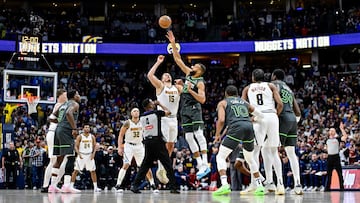 DENVER, COLORADO - APRIL 1: Nikola Jokic #15 of the Denver Nuggets and Rudy Gobert #27 of the Minnesota Timberwolves jump for the opening tip off in the first half of a game at Ball Arena on April 1, 2025 in Denver, Colorado. NOTE TO USER: User expressly acknowledges and agrees that, by downloading and or using this photograph, User is consenting to the terms and conditions of the Getty Images License Agreement. Dustin Bradford/Getty Images/AFP (Photo by Dustin Bradford / GETTY IMAGES NORTH AMERICA / Getty Images via AFP)