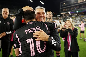 Inter Miami CF forward Lionel Messi (10) celebrates with head coach Gerardo Martino.