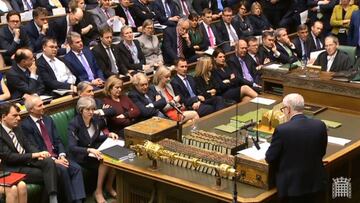A video grab from footage broadcast by the UK Parliament's Parliamentary Recording Unit (PRU) shows Opposition Labour party leader Jeremy Corbyn (R) speaking during Britain's Prime Minister Theresa May's (3L) statement on Britain's res