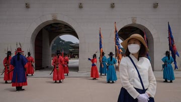 Costumed royal guards take part in a &#039;changing of the guards&#039; ceremony at Gyeongbokgung palace in Seoul on May 21, 2020. - The ceremony has been re-started following a hiatus due to preventative measures against the COVID-19 novel coronavirus. (