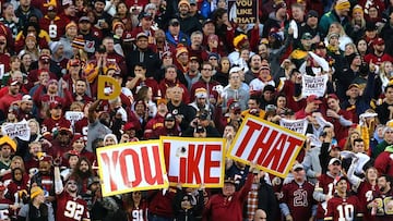 LANDOVER, MD - JANUARY 10: Fans hold signs in the first quarter during the NFC Wild Card Playoff game between the Green Bay Packers and the Washington Redskins at FedExField on January 10, 2016 in Landover, Maryland.   Elsa/Getty Images/AFP
 == FOR NEWSPAPERS, INTERNET, TELCOS &amp; TELEVISION USE ONLY ==