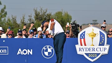 Europe's Spanish golfer, Jon Rahm plays his shot from the 11th tee during his foursomes match on the second day of play in the 44th Ryder Cup at the Marco Simone Golf and Country Club in Rome on September 30, 2023. (Photo by Andreas SOLARO / AFP)