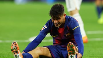 Soccer Football - LaLiga - Real Madrid v FC Barcelona - Santiago Bernabeu, Madrid, Spain - October 26, 2025 FC Barcelona's Pedri reacts REUTERS/Albert Gea