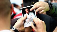MONTREAL, QC - JUNE 07: Valtteri Bottas of Finland and Mercedes GP signs autographs for fans during previews ahead of the Canadian Formula One Grand Prix at Circuit Gilles Villeneuve on June 7, 2018 in Montreal, Canada.   Mark Thompson/Getty Images/AFP
 == FOR NEWSPAPERS, INTERNET, TELCOS &amp; TELEVISION USE ONLY ==