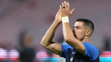 Nassr's Portuguese forward #07 Cristiano Ronaldo greets the fans ahead of the Saudi Pro League football match between Al-Wehda and Al-Nassr at the King Abdul Aziz Stadium in Mecca on November 11, 2023. (Photo by AFP)