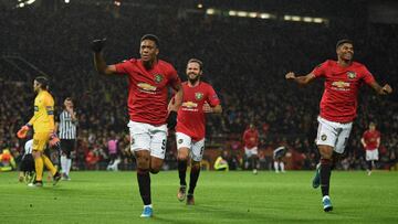 Manchester United&#039;s French striker Anthony Martial (2nd L) runs to celebrate scoring their second goal during the UEFA Europa League Group L football match between Manchester United and Partizan Belgrade at Old Trafford in Manchester, north west Engl