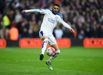 Today's goal scorer, Riyad Mahrez, controls the ball with one of his wands.