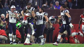 HOUSTON, TX - FEBRUARY 05: Tom Brady #12 of the New England Patriots celebrates after defeating the Atlanta Falcons 34-28 in overtime during Super Bowl 51 at NRG Stadium on February 5, 2017 in Houston, Texas. Mike Ehrmann/Getty Images/AFP
== FOR NEWSPAPERS, INTERNET, TELCOS & TELEVISION USE ONLY ==