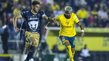 Lisandro Magallan (L) of Pumas fights fir the ball with Rodrigo Aguirre (R) of America during the 10th round match between America and Pumas UNAM as part of the Liga BBVA MX, Torneo Apertura 2024 at Ciudad de los Deportes Stadium on September 29, 2024 in Mexico City, Mexico.