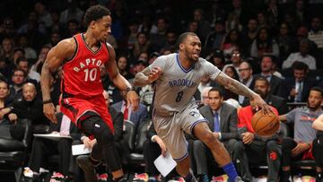 Jan 17, 2017; Brooklyn, NY, USA; Brooklyn Nets shooting guard Sean Kilpatrick (6) loses control of the ball while defended by Toronto Raptors shooting guard DeMar DeRozan (10) during the fourth quarter at Barclays Center. Mandatory Credit: Brad Penner-USA TODAY Sports