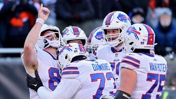 CHICAGO, ILLINOIS - DECEMBER 24: Dawson Knox #88 of the Buffalo Bills celebrates a touchdown during the fourth quarter in the game against the Chicago Bears at Soldier Field on December 24, 2022 in Chicago, Illinois.   Michael Reaves/Getty Images/AFP (Photo by Michael Reaves / GETTY IMAGES NORTH AMERICA / Getty Images via AFP)