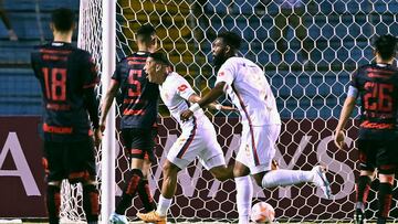 Olimpia's Kevin Lopez (C) celebrates after scoring against Atlas during the CONCACAF Champions League first leg football match between Honduras' Olimpia and Mexico's Atlas, at the Olimpico Metropolitano stadium in San Pedro Sula, Honduras, on March 8, 2023. (Photo by Orlando SIERRA / AFP)