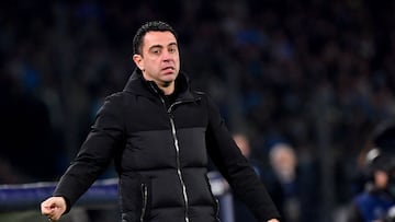 Barcelona's Spanish coach Xavi reacts during the UEFA Champions League round of 16 first Leg football match between Napoli and Barcelona at the Diego-Armando-Maradona stadium in Naples on February 21, 2024. (Photo by Tiziana FABI / AFP)