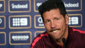 Atletico Madrid manager Diego Simeone attends a press conference prior to a football training session at AAMI Park in Melbourne on July 28, 2016. / AFP PHOTO / SAEED KHAN / --IMAGE RESTRICTED TO EDITORIAL USE - STRICTLY NO COMMERCIAL USE--