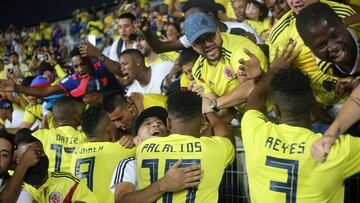 Colombia's players celebrate at the end of their South American U-20 football match against Chile during their South American U-20 football match at El Teniente stadium in Rancagua, Chile on January 25, 2019.