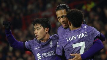 Liverpool's Dutch defender #04 Virgil van Dijk (C) celebrates scoring the opening goal with Liverpool's Japanese midfielder #03 Wataru Endo (L) and Liverpool's Colombian midfielder #07 Luis Diaz during the English Premier League football match between Sheffield United and Liverpool at Bramall Lane in Sheffield, northern England on December 6, 2023. (Photo by Darren Staples / AFP) / RESTRICTED TO EDITORIAL USE. No use with unauthorized audio, video, data, fixture lists, club/league logos or 'live' services. Online in-match use limited to 120 images. An additional 40 images may be used in extra time. No video emulation. Social media in-match use limited to 120 images. An additional 40 images may be used in extra time. No use in betting publications, games or single club/league/player publications. / 