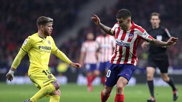 MADRID, SPAIN - FEBRUARY 23:  Angel Correa of Atletico Madrid battles for possession with Alberto Moreno of Villarreal during the La Liga match between Club Atletico de Madrid and Villarreal CF at Wanda Metropolitano on February 23, 2020 in Madrid, Spain.