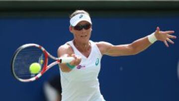 Samantha Stosur of Australia returns the ball against Madison Keys of the US during their semi-final of the Japan Women's Open tennis tourament in Osaka on October 12, 2013. Stosur defeated Keys 6-1, 6-2. AFP PHOTO / JIJI PRESS JAPAN OUT