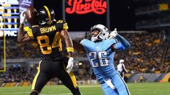 PITTSBURGH, PA - NOVEMBER 16: Antonio Brown #84 of the Pittsburgh Steelers makes a catch for a 10-yard touchdown reception in front of Logan Ryan #26 of the Tennessee Titans in the fourth quarter during the game at Heinz Field on November 16, 2017 in Pittsburgh, Pennsylvania.   Joe Sargent/Getty Images/AFP
 == FOR NEWSPAPERS, INTERNET, TELCOS &amp; TELEVISION USE ONLY ==